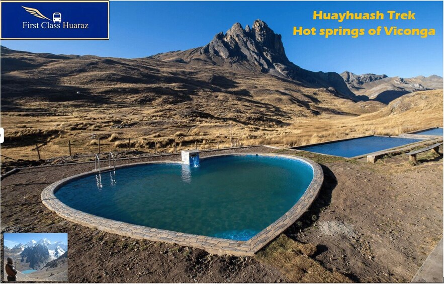A pool surrounded by dry grass and mountains. 3