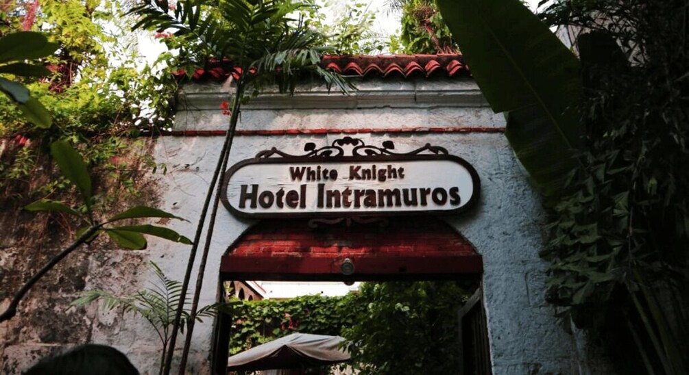 A sign for White Knight Hotel Intramuros. 2
