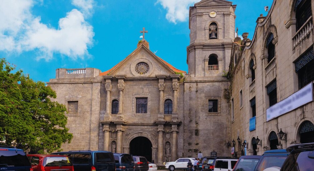 A historic church with a bell tower and a clock. 5
