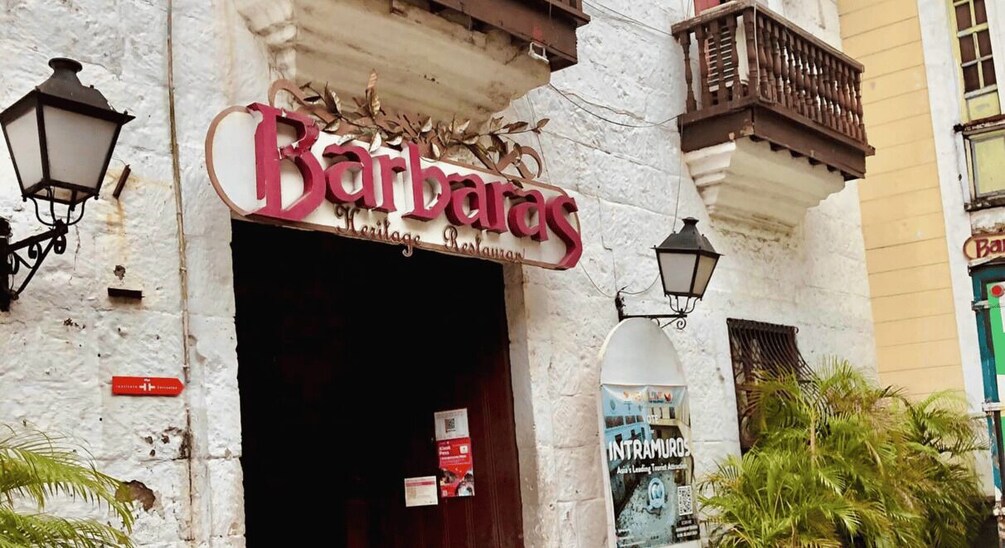 A restaurant named 'Barbaras' with a sign above the entrance. 4