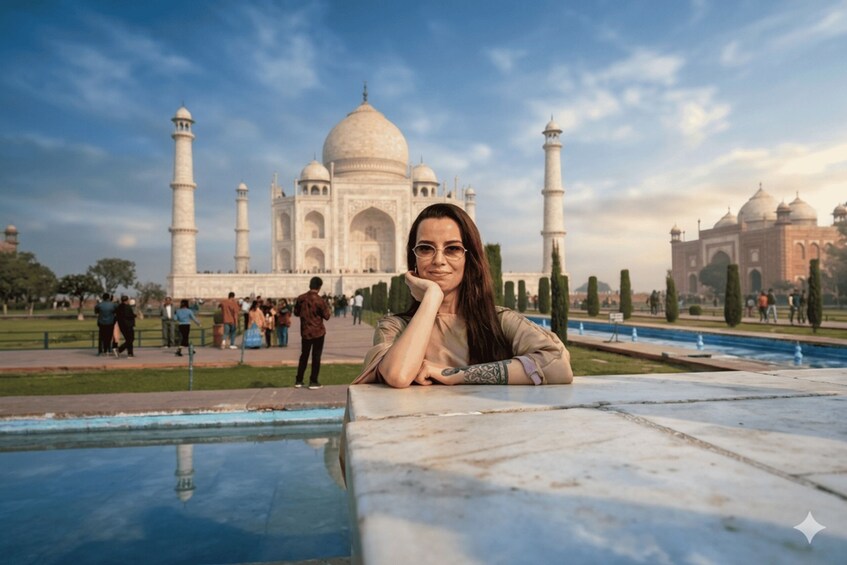 A person sitting at a marble table with the Taj Mahal in the background. 1