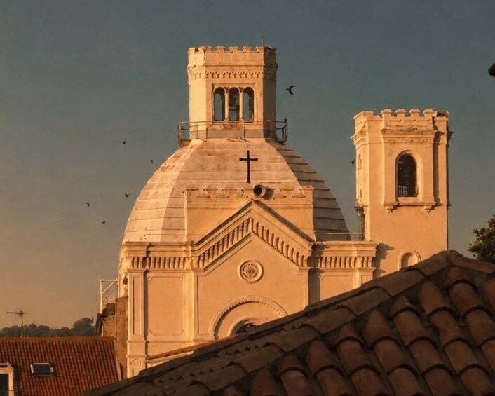 A church with a dome and bell tower. 4