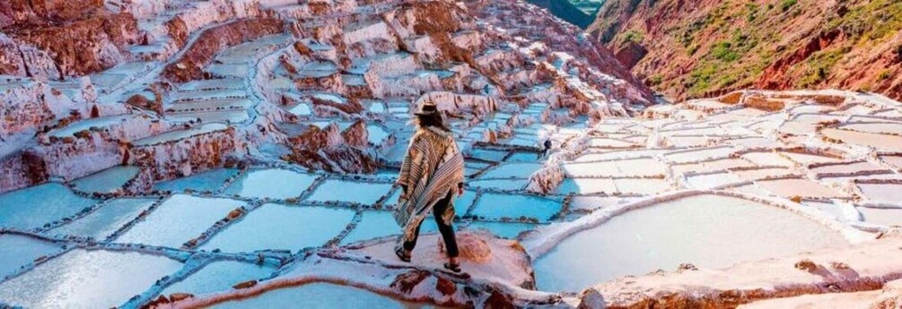 Terraced pools with a person standing on the edge. 2