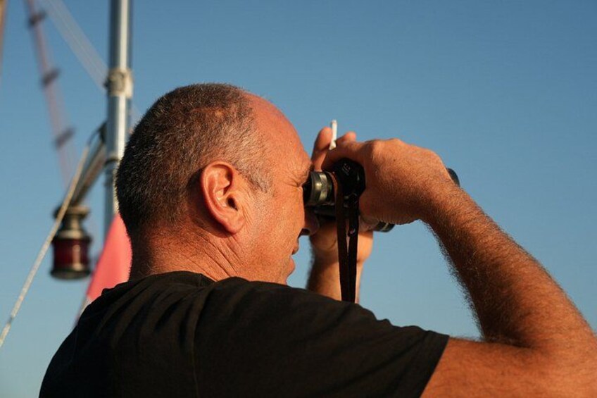 A person using a camera. 4