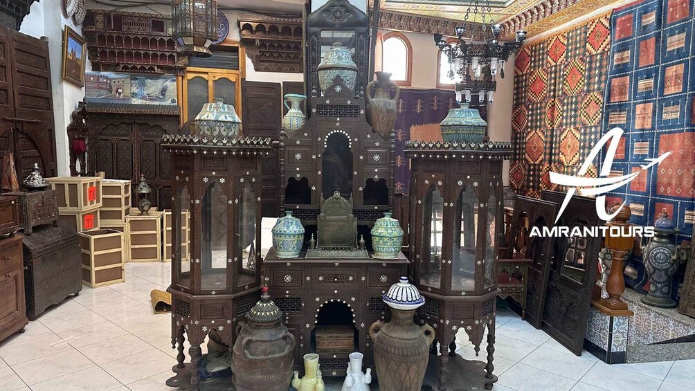 A traditional market with wooden furniture, pottery, and textiles. 3