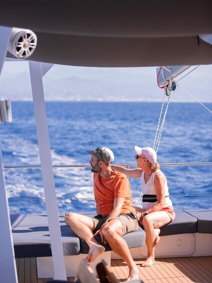 A couple on a boat with a view of the ocean. 1