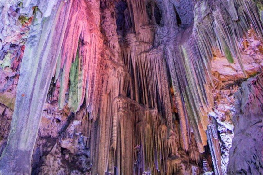 A cave with stalactites and stalagmites. 2