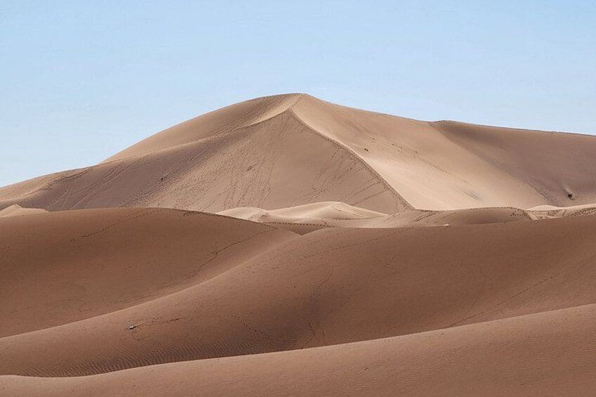 Sand dunes with a clear sky. 5