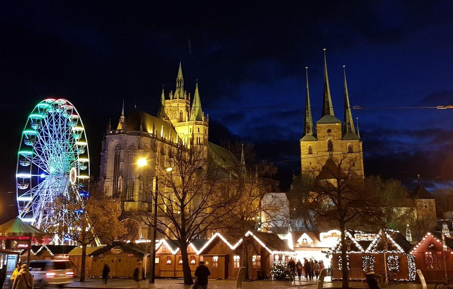 A Ferris wheel, a cathedral, and a Christmas market. 5