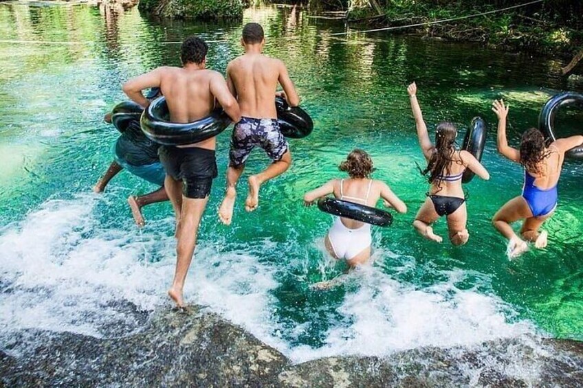 Friends, tubes, and tropical views. There's no better way to cool off at Eden on the River 2