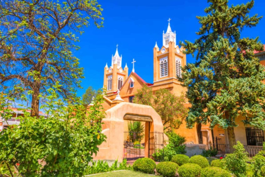 A church with two towers and an archway. 2