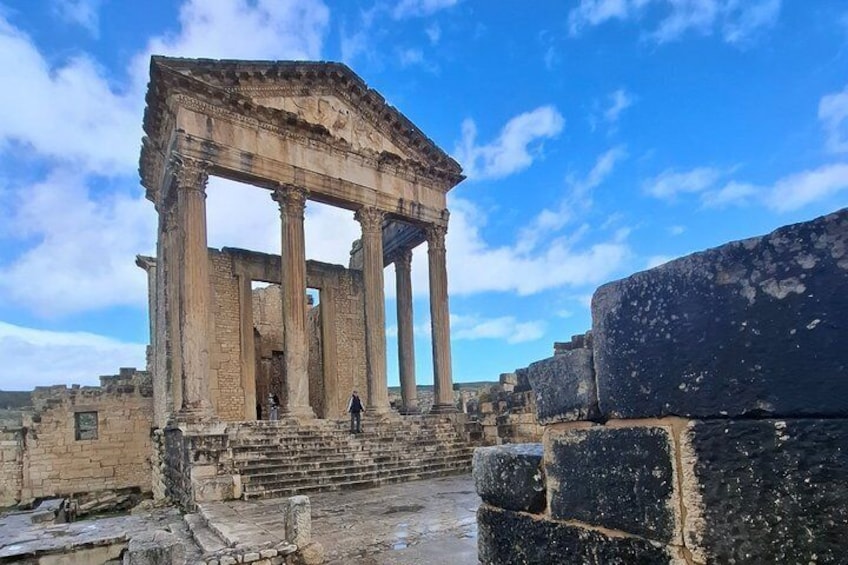 Ancient ruins with columns and stone blocks. 1