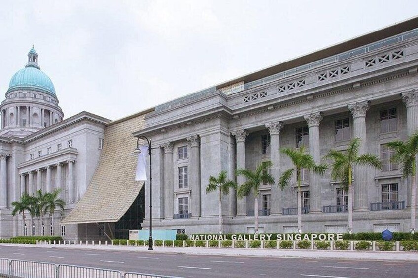 Un grand bâtiment doté d’un dôme imposant et d’une extension moderne. 2