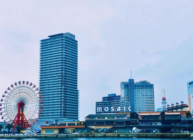 A cityscape with a tall building, a Ferris wheel, and a building labeled 'MOSAIC'. 1