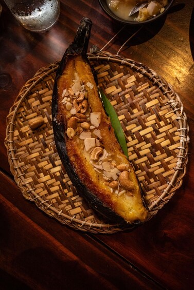 A banana on a woven basket. 4
