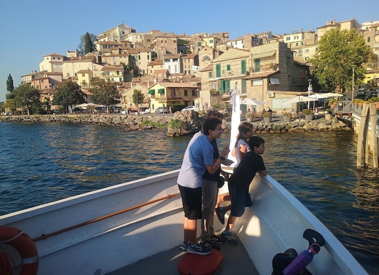 Discover Anguillara village, Lake Boat Tour and Sunset Swim 1