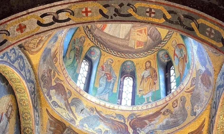 A mosaic with religious figures and symbols. 3