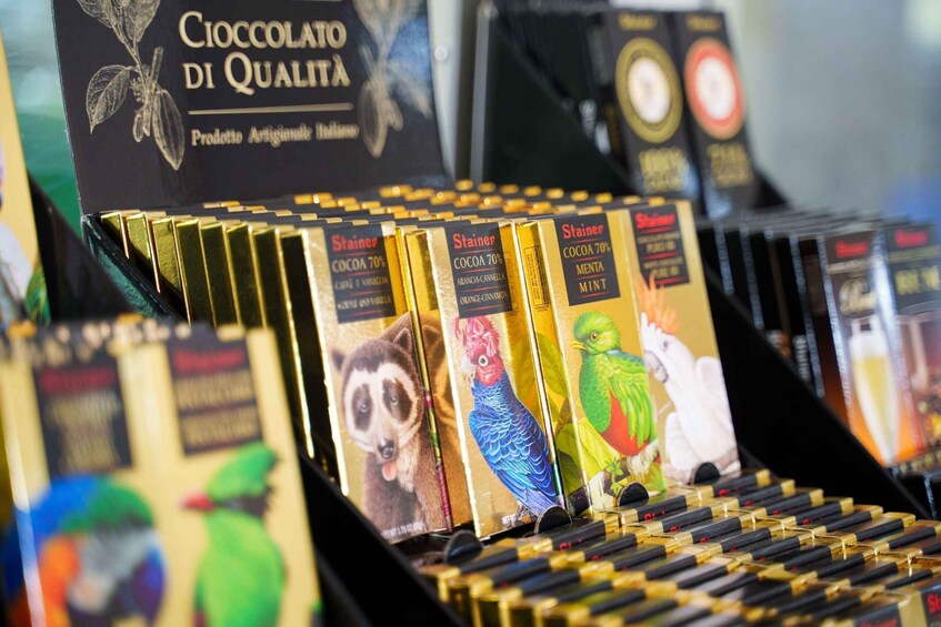 A display of chocolate bars with various packaging designs and labels. 4