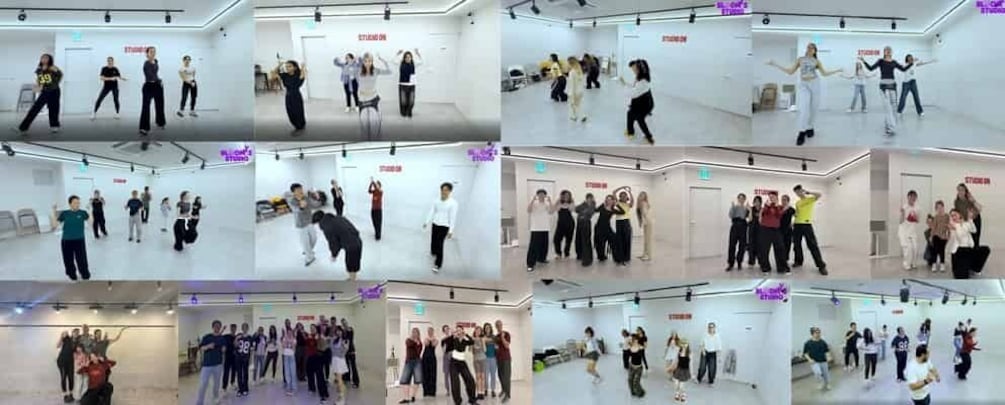 A dance studio with multiple groups of people practicing dance routines. 5