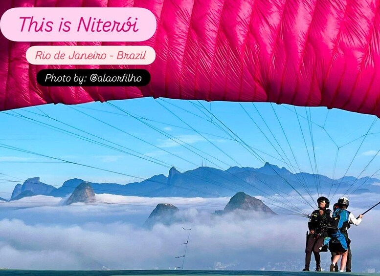 A person paragliding over Rio de Janeiro, Brazil, with mountains and clouds in the background. 2