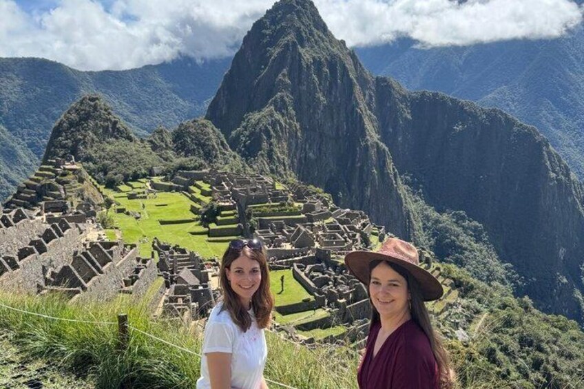 Machu Picchu with terraced fields and ancient stone structures. 4