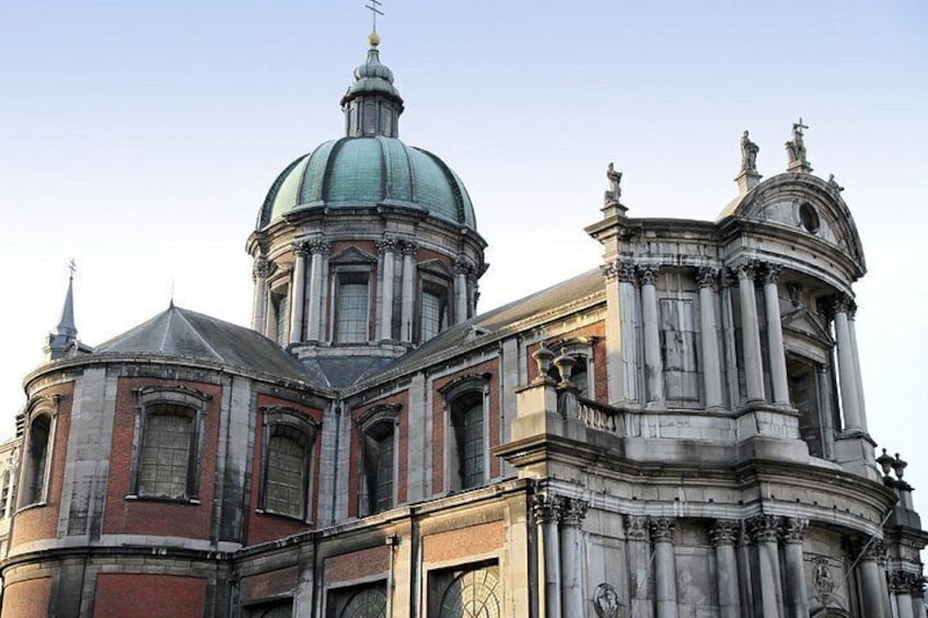 A historic building with a prominent dome and classical architecture. 3