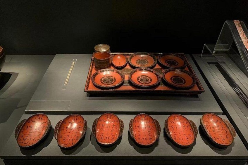 A display of traditional pottery with intricate designs. 4