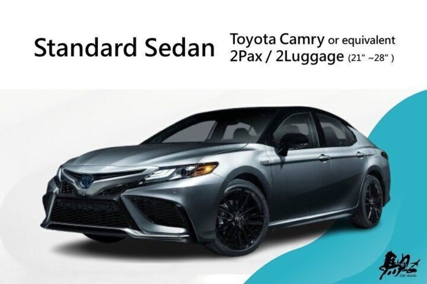 A Toyota Camry sedan with black rims, a black grille, and a front spoiler. 4