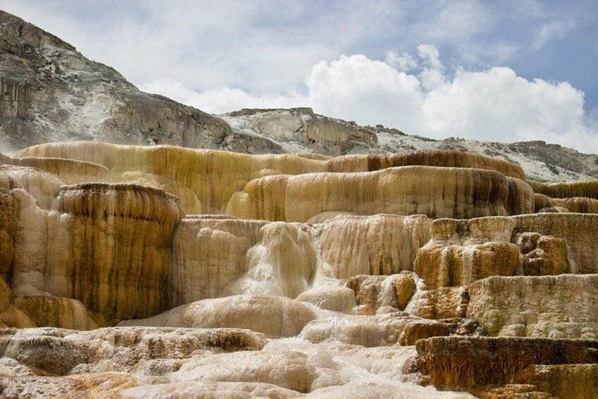 Terraced travertine formations in a natural landscape. 2