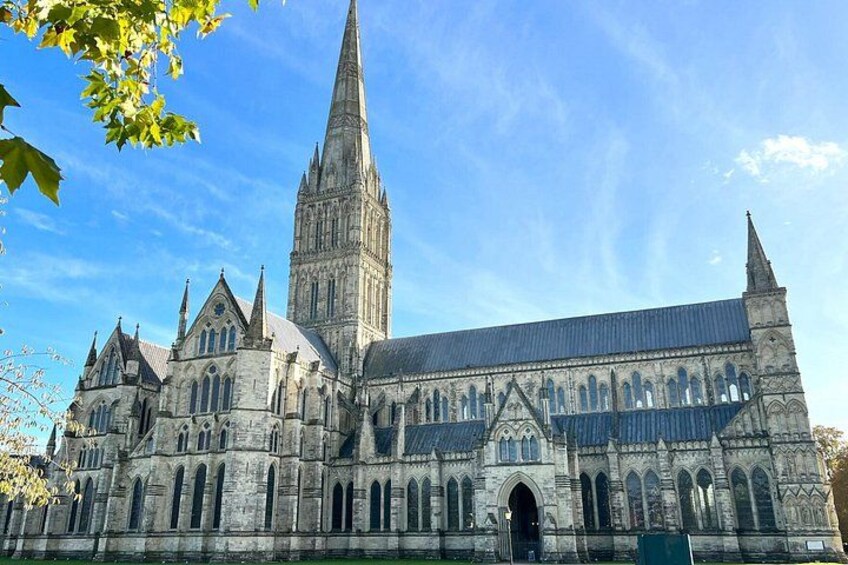 A large Gothic cathedral with a tall spire, arched windows, and a large entrance. 4