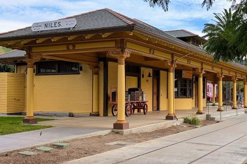 A yellow building with a sign reading 'Niles.' 5