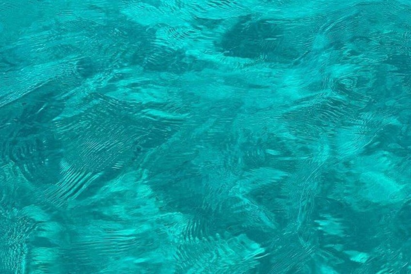 A textured surface with a pattern resembling water ripples or waves. 3