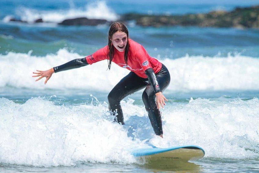 A person surfing on a wave. 2