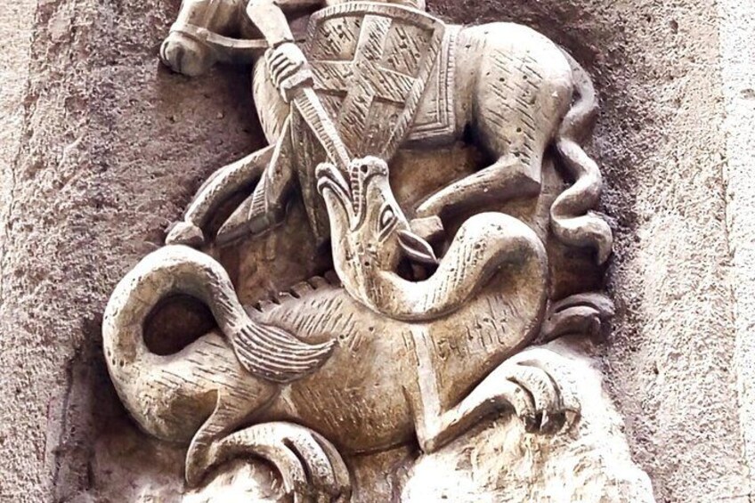 A carved stone relief of a horse and rider. 5