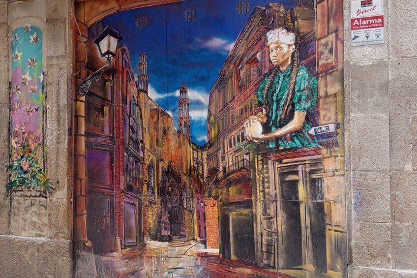 A mural of a street scene with buildings and a person. 4
