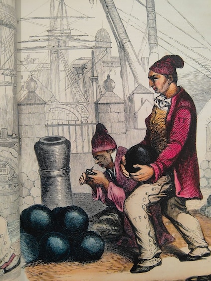 A person in traditional attire sitting and reading a book, with a large sack and a group of blue spheres nearby. 5