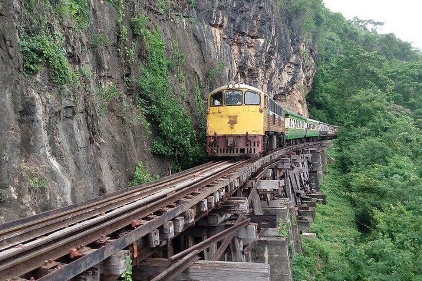A train on a narrow mountain railway track. 3