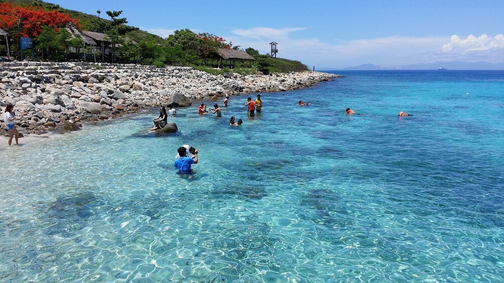 Swimmers in the ocean in Nha Trang