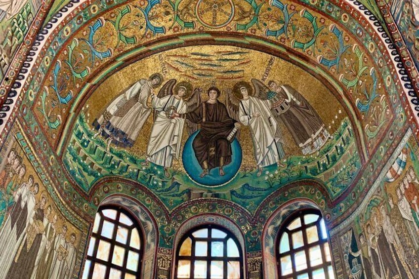 A mosaic with religious figures, ornate arches, and a detailed ceiling. 1