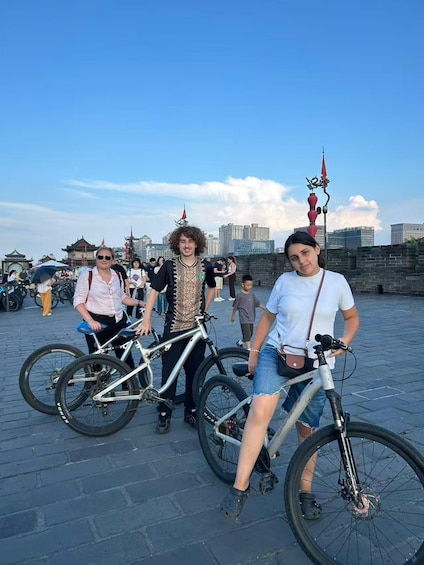 Picture 2 for Activity Xi'an: Small Group City Wall Bike Tour with Guide in Sunset 4