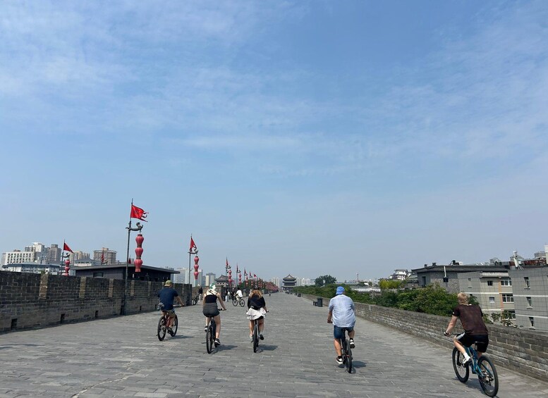 Picture 9 for Activity Xi'an: Small Group City Wall Bike Tour with Guide in Sunset 3