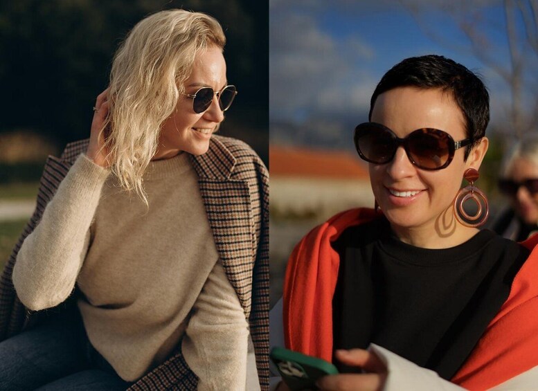 Two individuals outdoors, one wearing a plaid jacket and the other a black top with a red scarf. 4