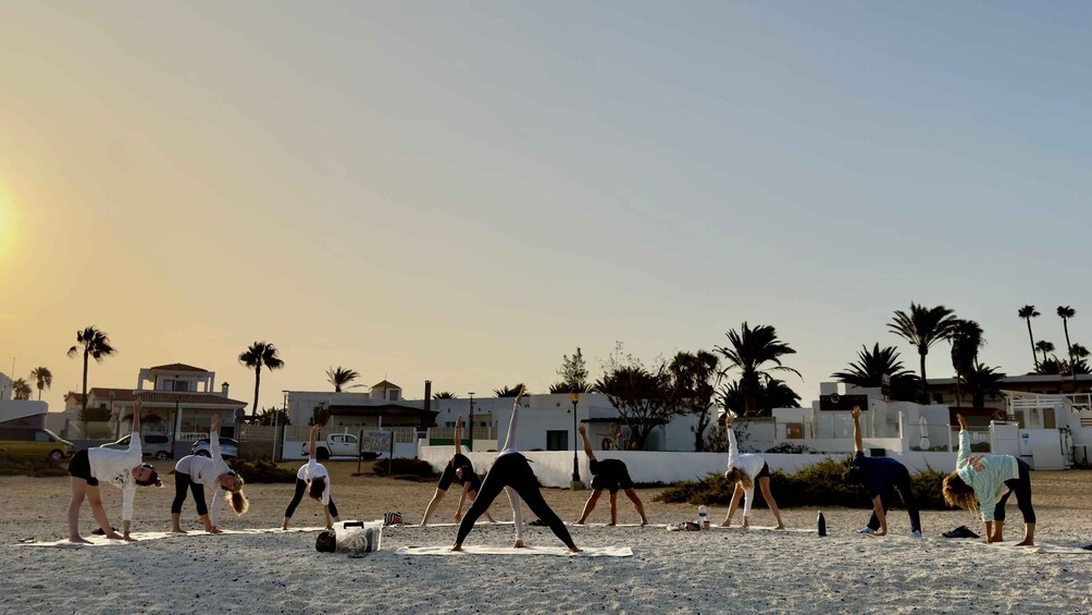 Picture 30 for Activity Corralejo: Sunrise Silent Yoga Experience at Popcorn Beach 4