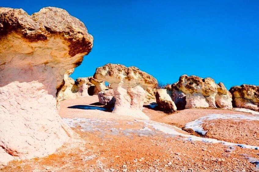 Rock formations with a clear blue sky. 4