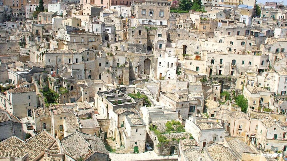 A densely packed urban area with historic buildings and narrow streets. 4