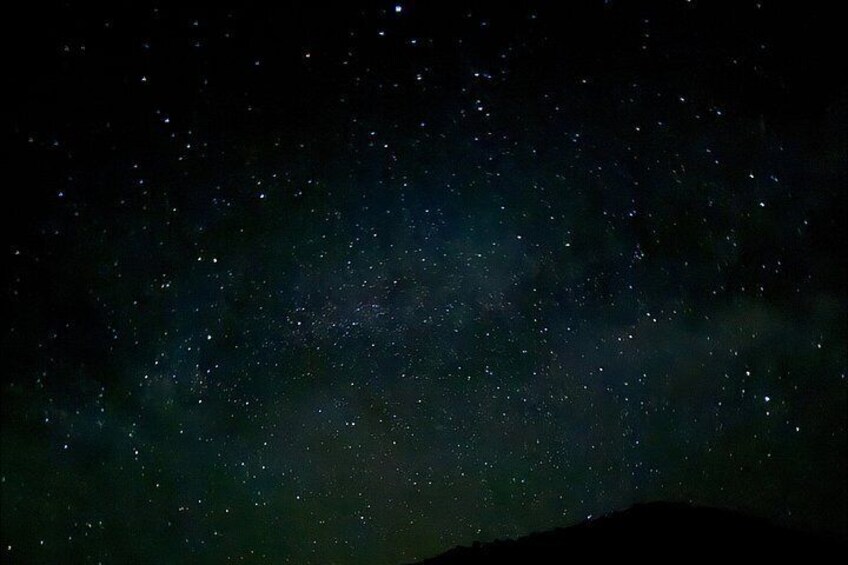 A starry night sky with a visible Milky Way. 2