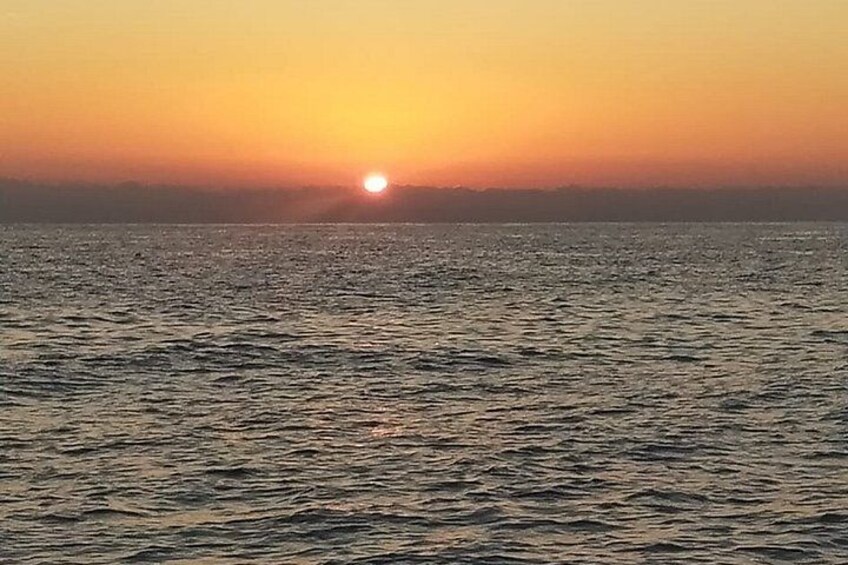 Sunset on a sailboat in the Gulf of Cagliari with aperitif 1