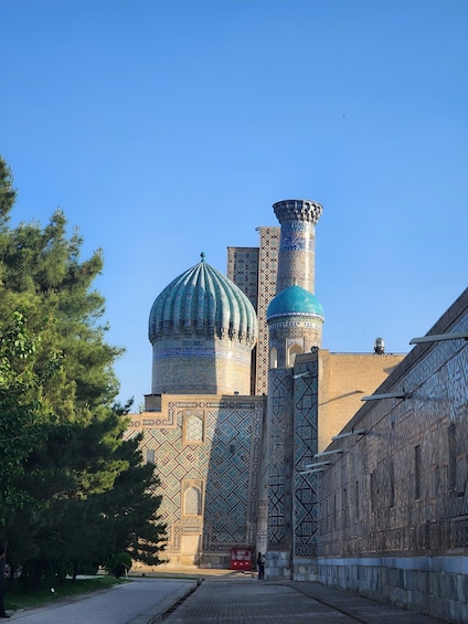 A historic building with intricate tile work and a prominent dome. 4