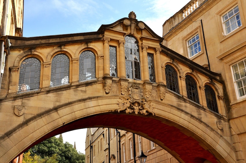 A stone bridge with ornate carvings and stained glass windows. 5