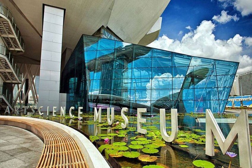 A modern building with a glass facade and the words 'SCIENCE MUSEUM' visible. 5
